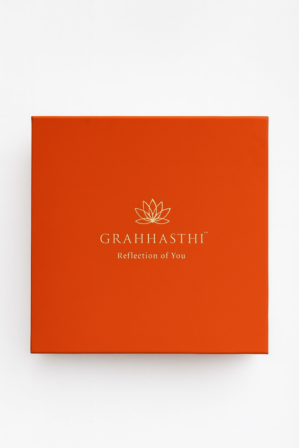 Ceremonial orange Rudraani rigid gift hamper box with gold Grahhasthi logo